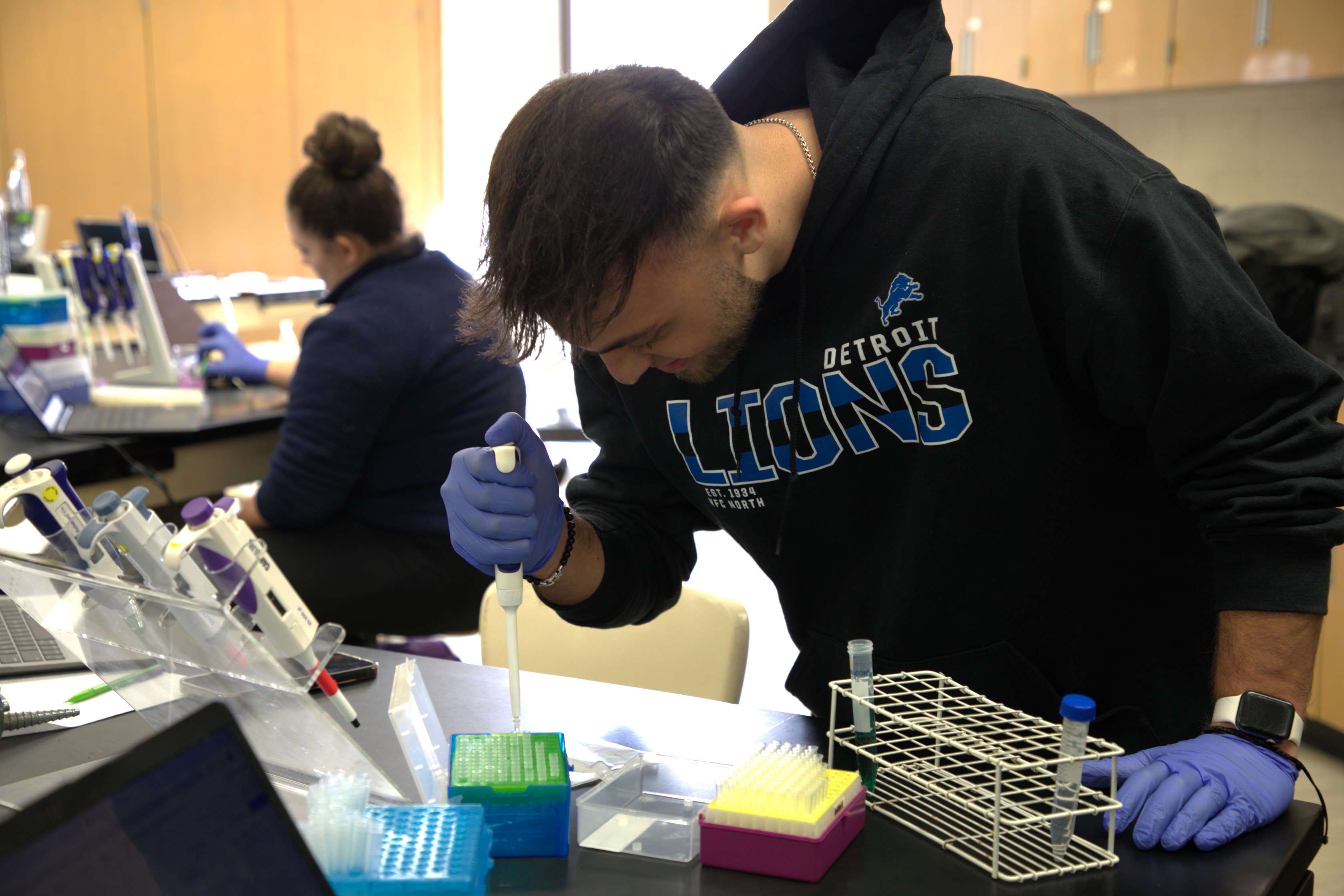 Student conducts biology research.