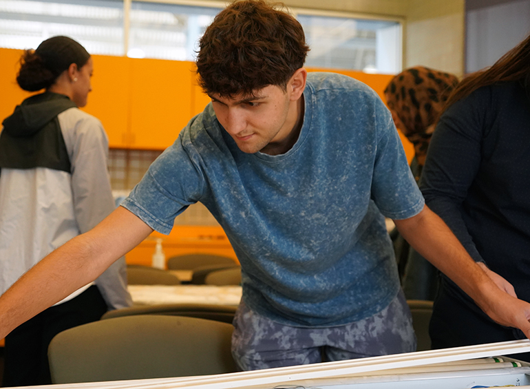 looking at a structure with a prof