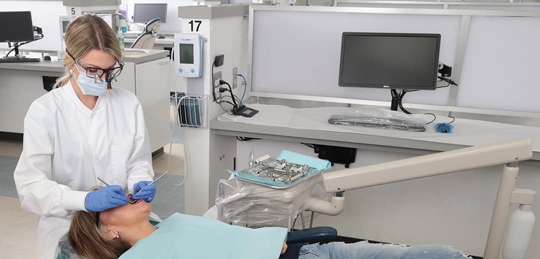 dental student working on patient