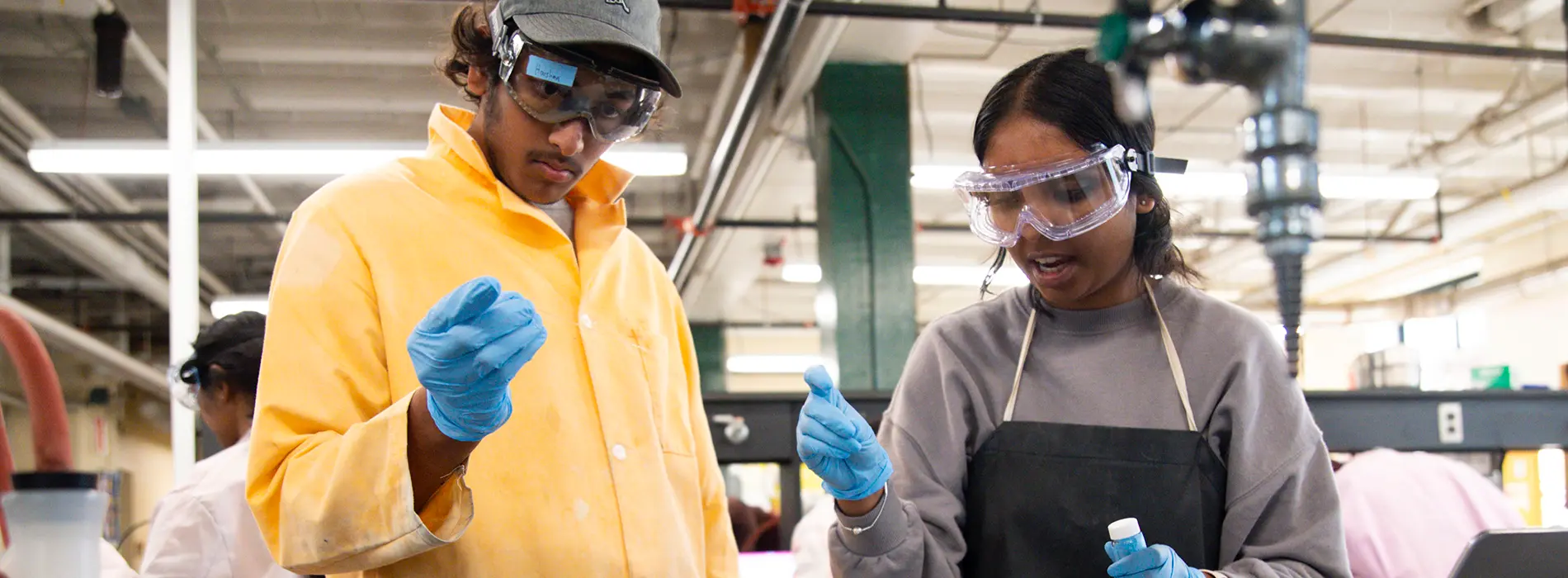 two students doing research in Chemistry Lab