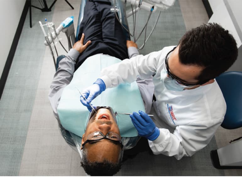 dental student with patient