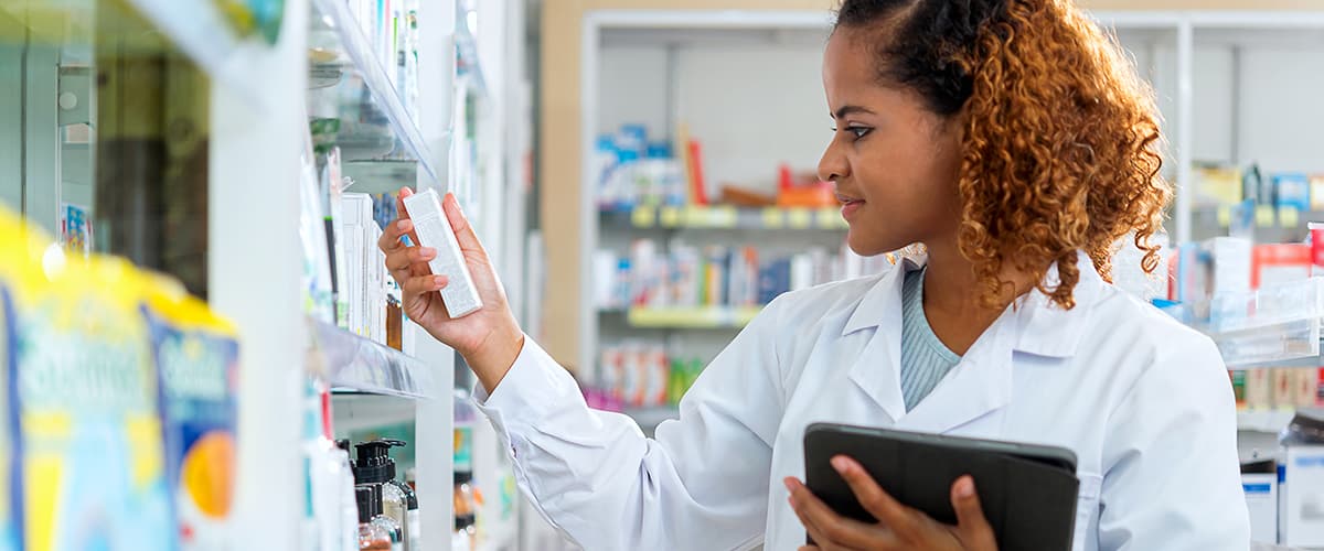 female pharmacist getting a medication