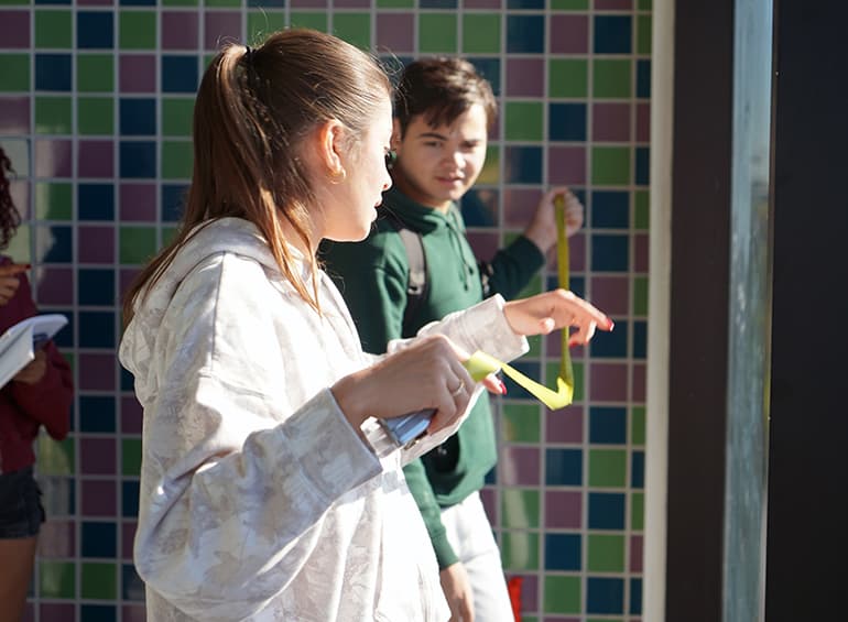 students measuring window in focus hope