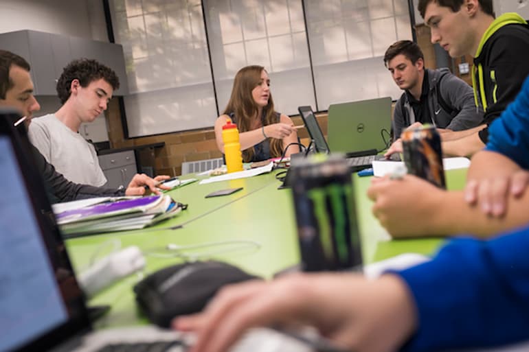 Students working at a lab table